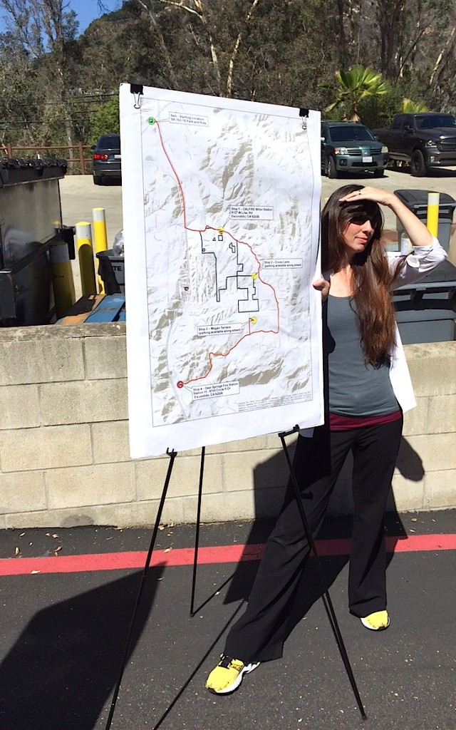 County Department of Planning and Land Use assistant with map of Lilac Hills Ranch displayed during planners tour this summer.