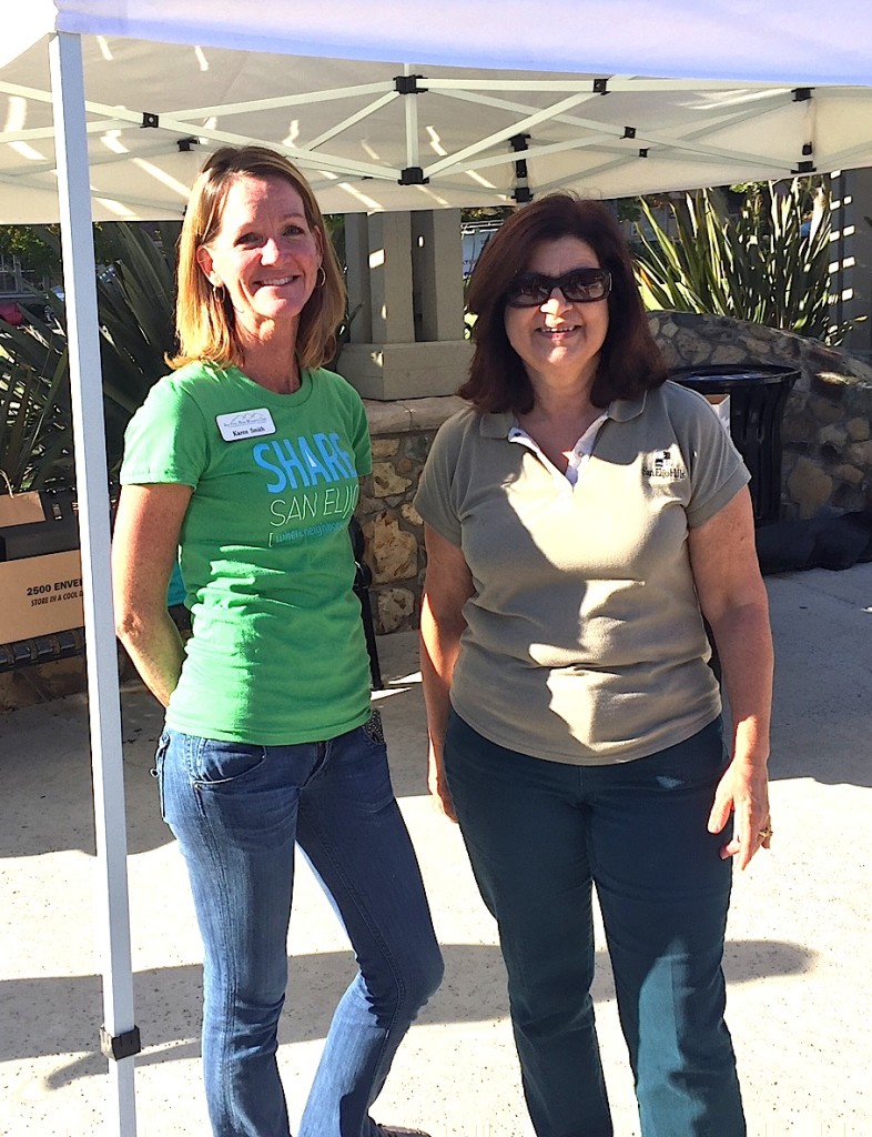  Event organizers Karen Friend Smith, left, and Faye Capps take a break from taking care of business.