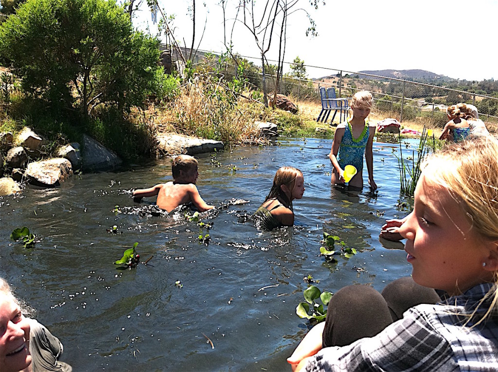 Kids hit the natural pond at Bheau View Ranch, Twin Oaks.