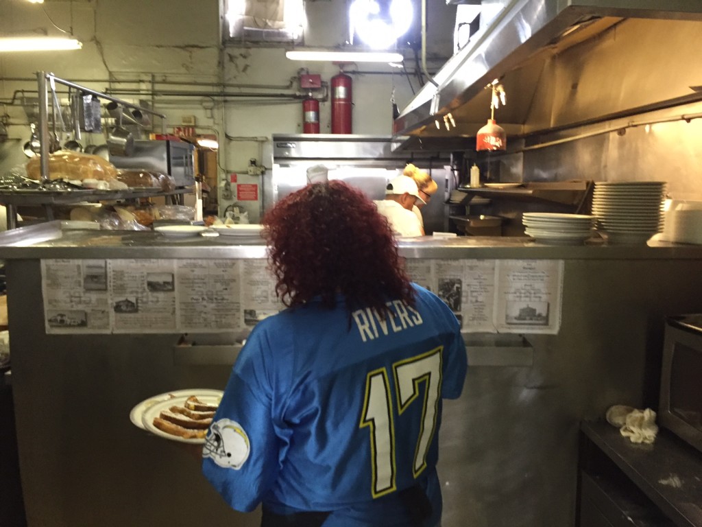 Annette Chapman, cooking, prepares last meals at champion's 