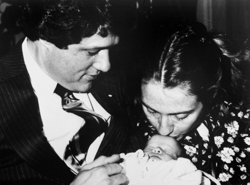 Bill, Hillary and Chelsea Clinton, 1980.