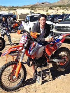 Kyle Hutcheson with his bike at an event.