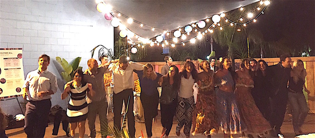 Led by Museum executive director Javier Guerrero (far left), dancers got jiggy with it near the evening's end.